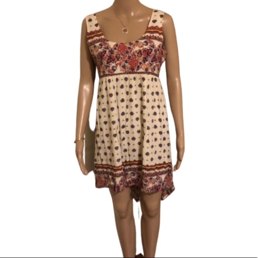 👇🏻$Reduced to lowest price. Cute hi-low w/ open low back size L